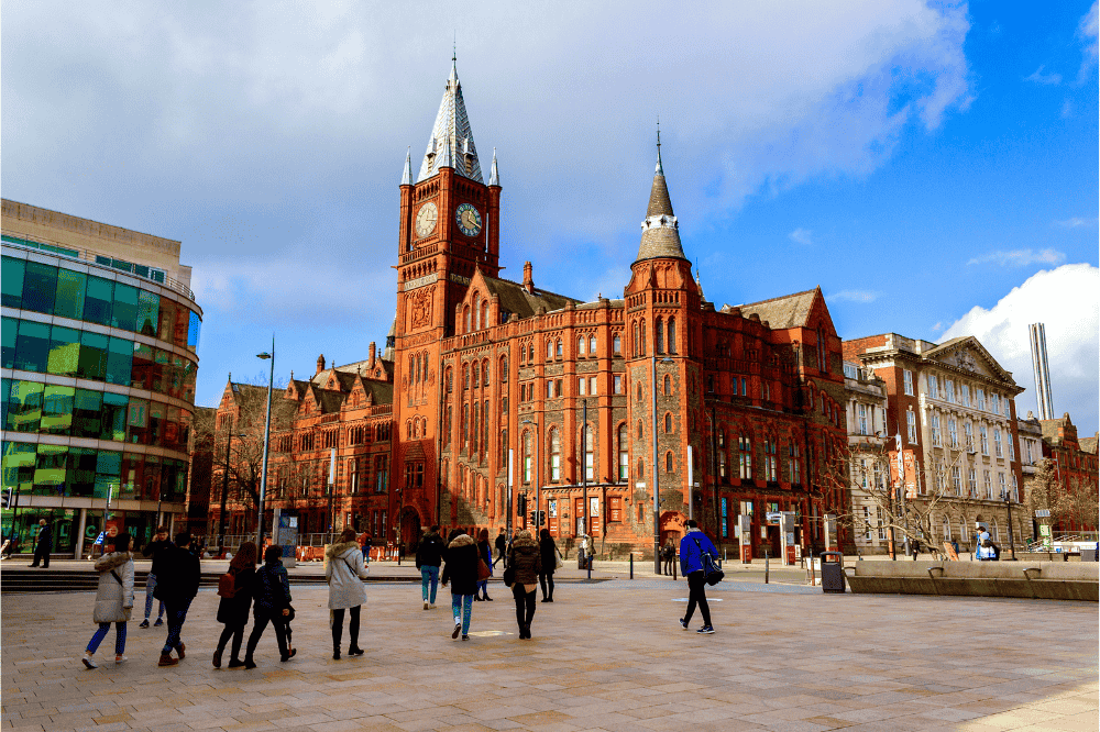 People walking around Victoria Building university of Liverpool
