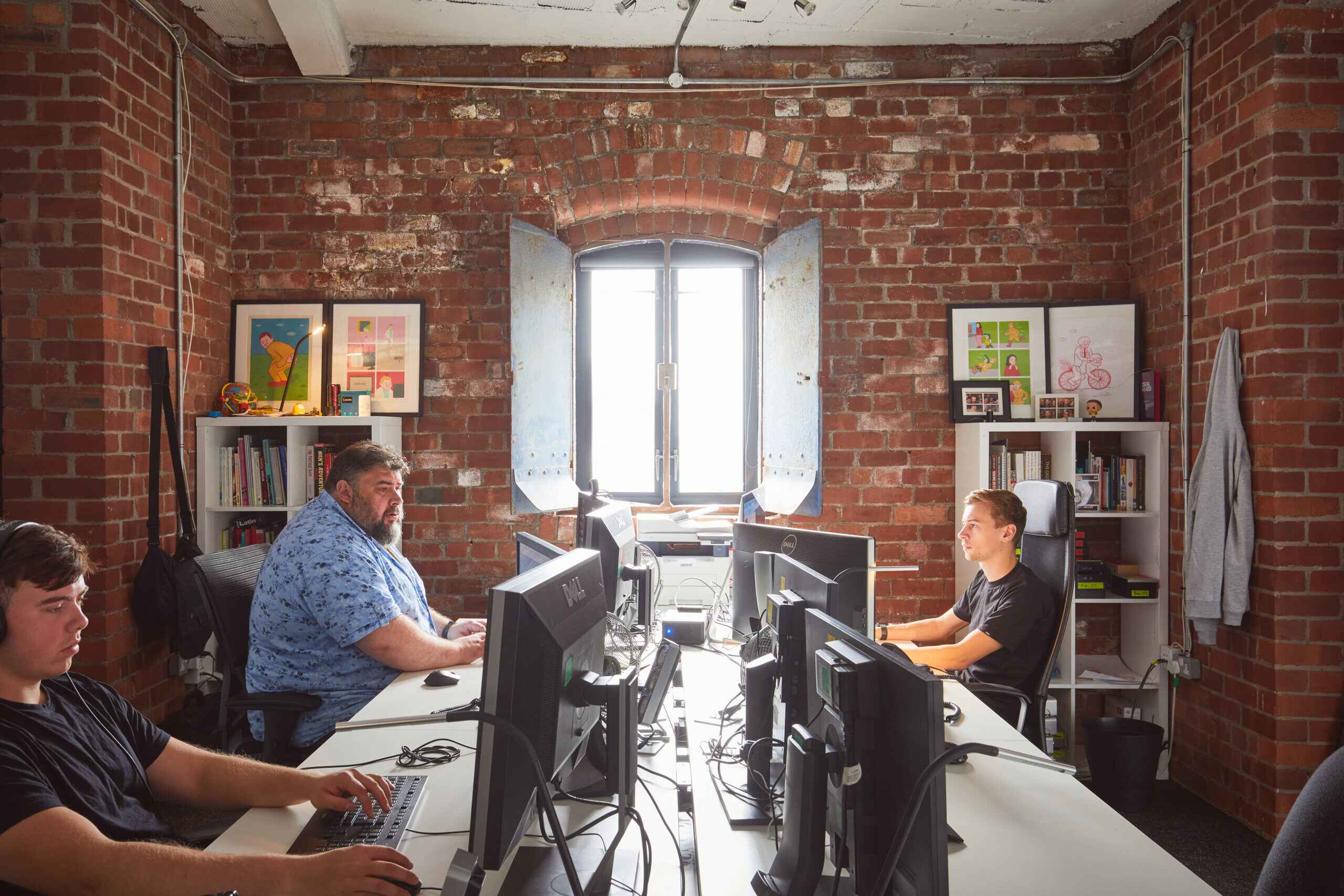 People working on computers inside studio space in Elevator studios Liverpool