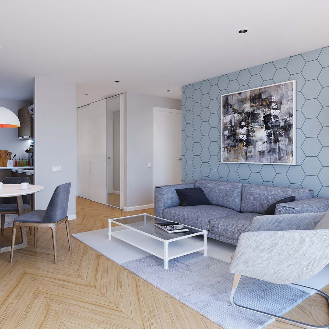 Depiction of the living room inside royal canal works with honeycomb pattern walls and a grey sofa
