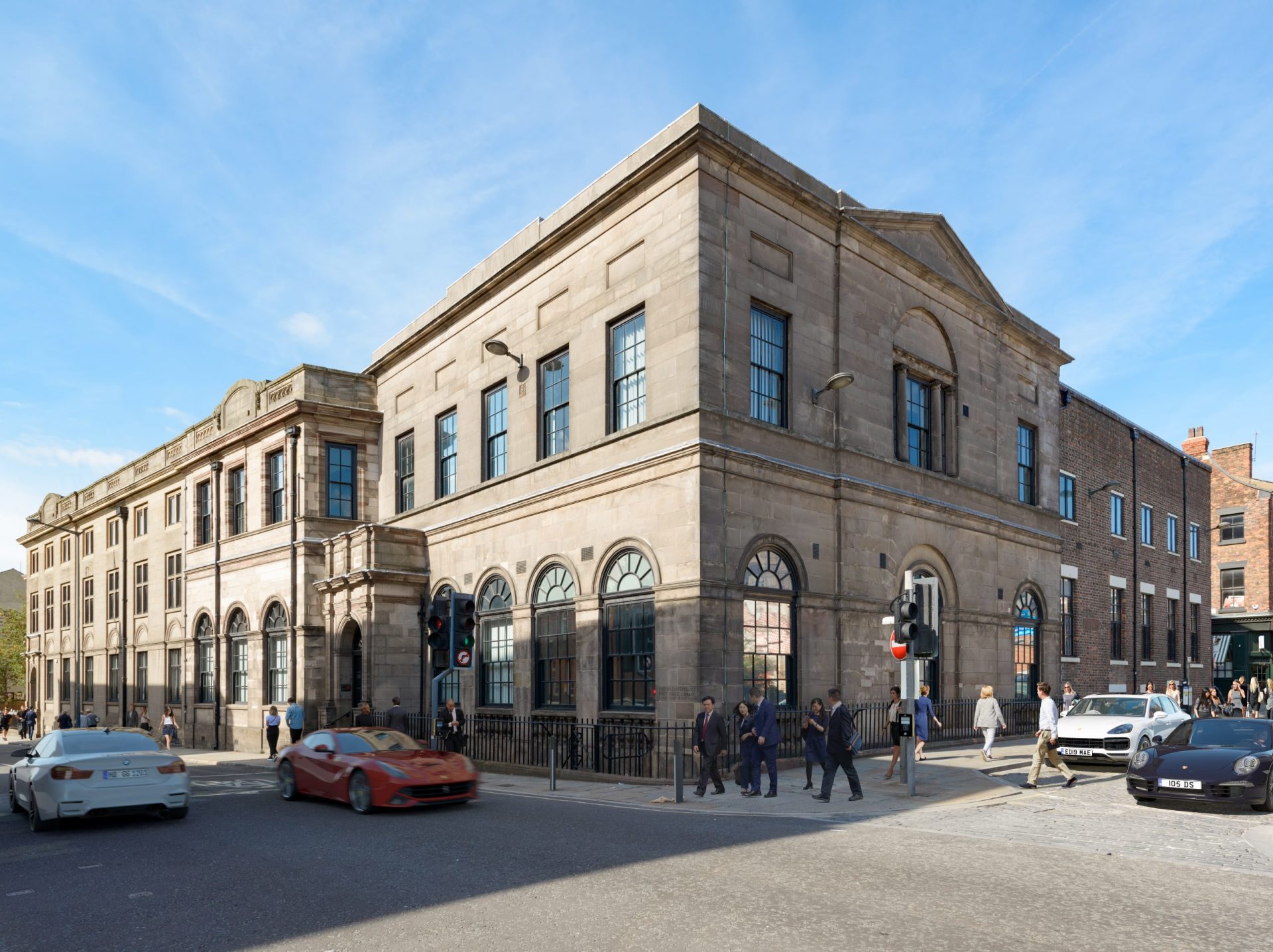 Duke and Parr exterior shot showing the angle toward the side sytreet with two floors and arched outdoor windows