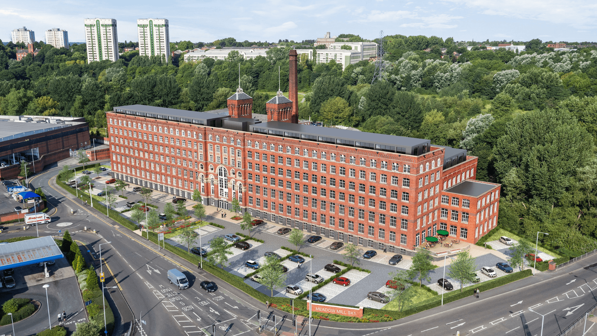 Meadow Mill, Stockport birds eye view of the exterior with car park and landscaping surrounding