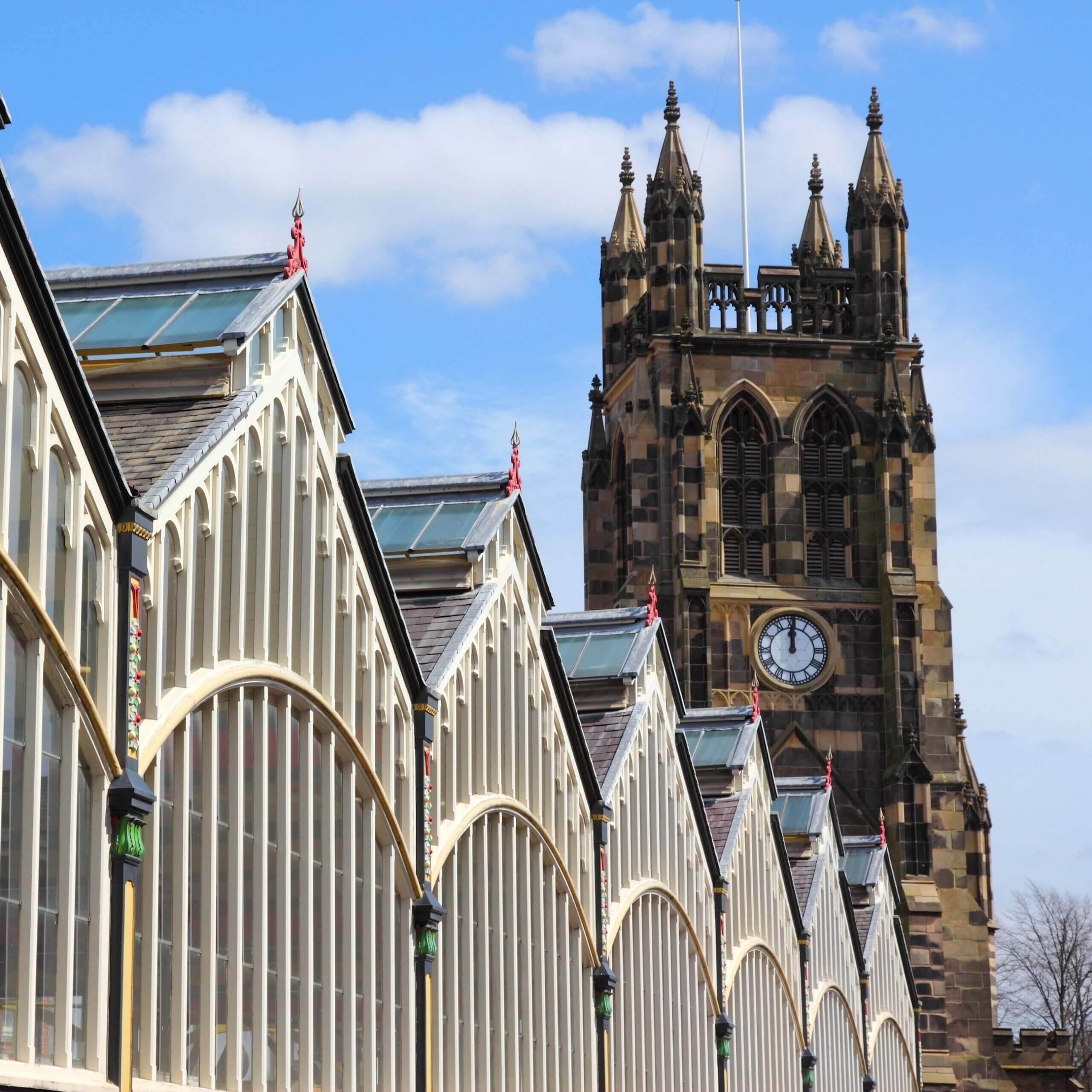 Stockport town hall and market with blue sky