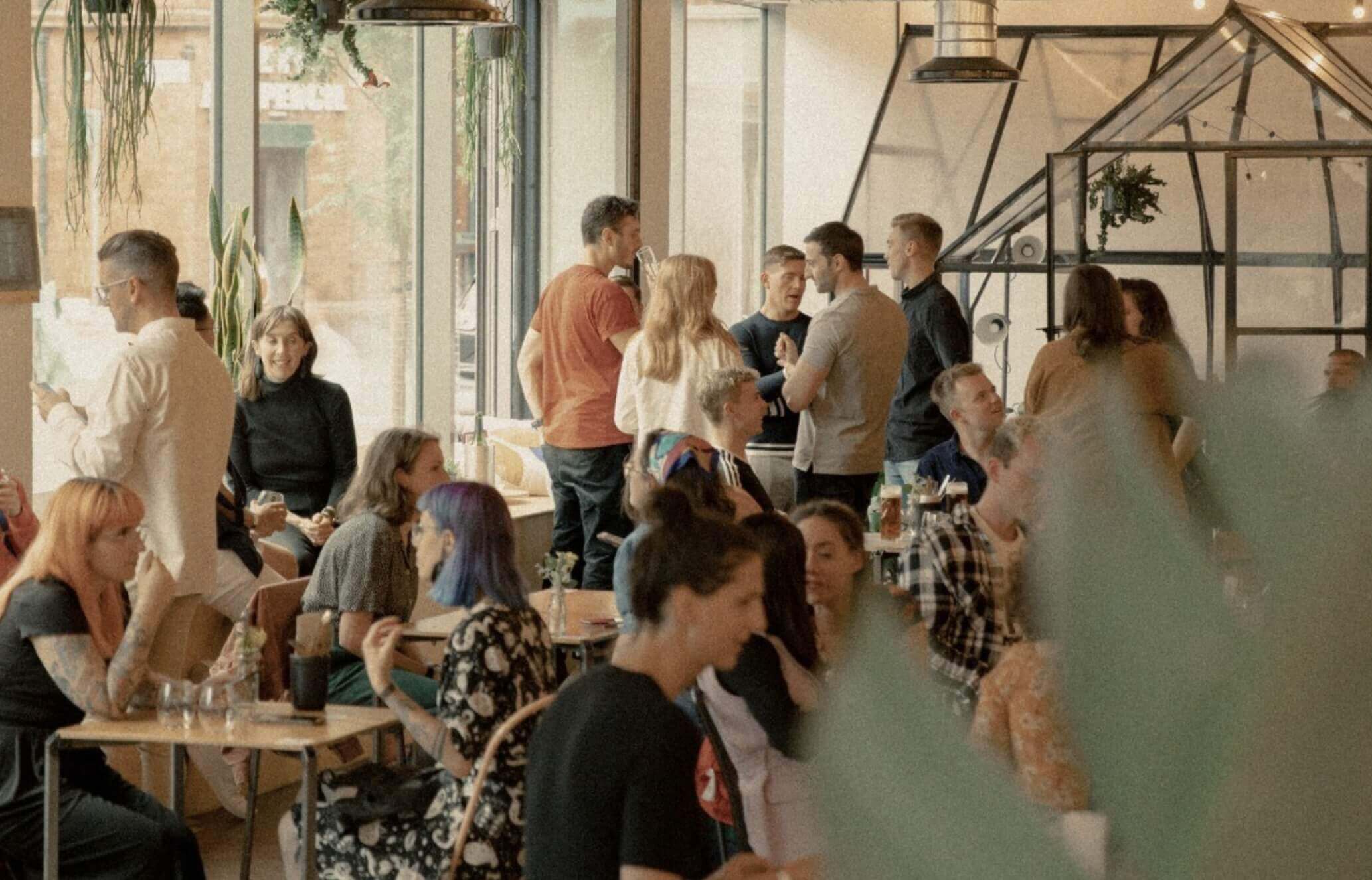 Busy Feel Good Club Health and Wellbeing Cafe Event at Hilton House Manchester