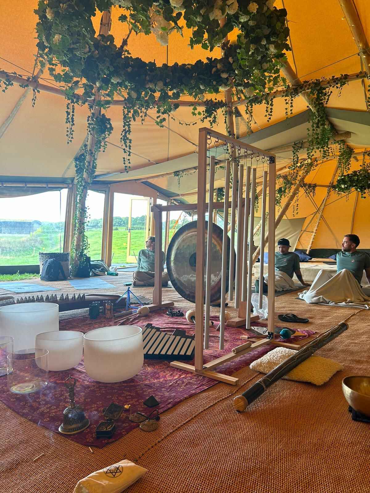 http://CERT%20Team%20enjoying%20a%20sound%20bath%20inside%20a%20tipi%20tent