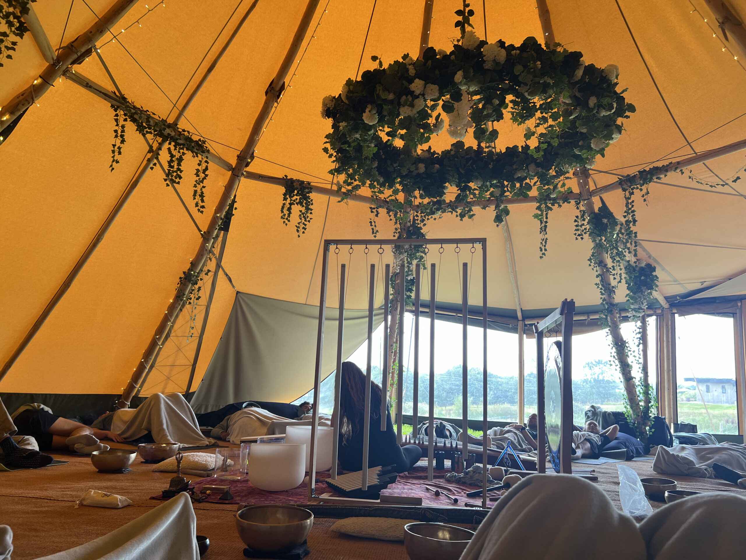 http://CERT%20Team%20enjoying%20a%20sound%20bath%20inside%20a%20tipi%20tent